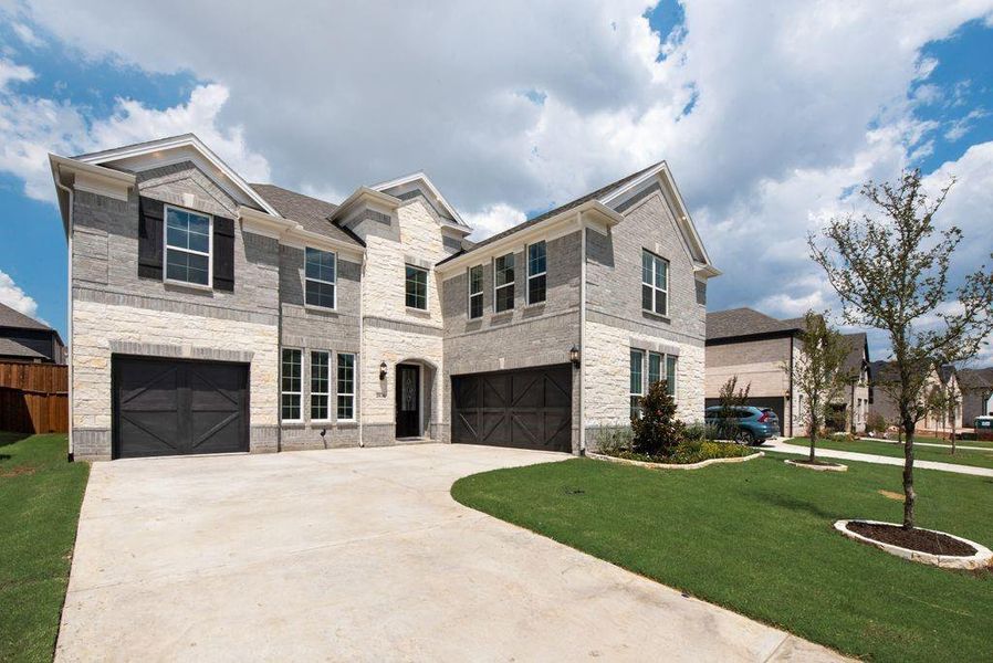 Front exterior of a new home in Wellspring Estates, Celina, TX, highlighting curb appeal (Image 16). Front exterior of a new home in Wellspring Estates, Celina, TX, highlighting curb appeal (Image 16).
