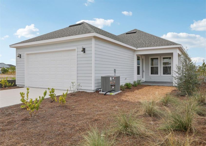 Exterior details and patio area of a home in Weslyn Park Single Family, St. Cloud (Image 26).