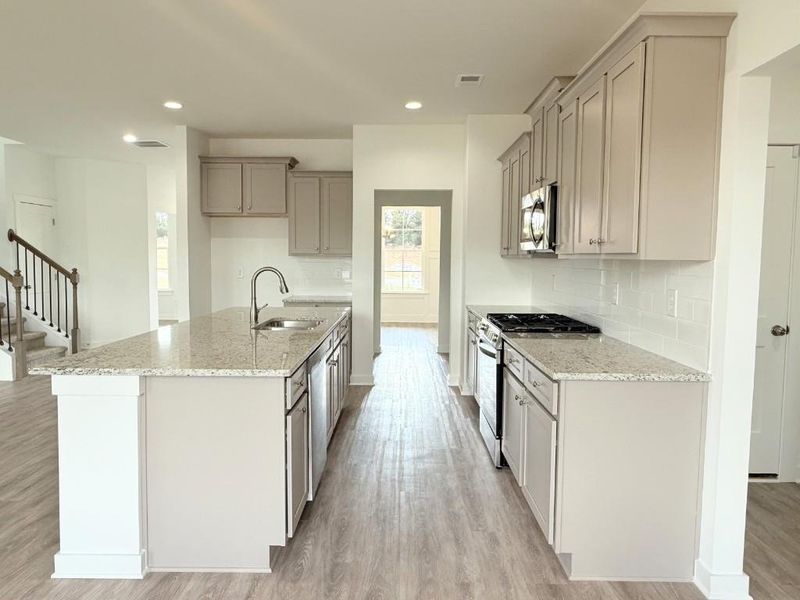 Furnished interior view inside a new home in Sutton's Landing, Statham (Image 3).
