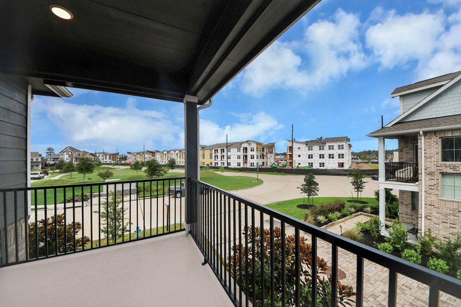 Exterior details and patio area of a home in The Groves, Humble (Image 31).
