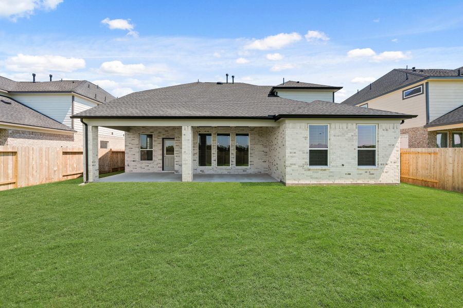 Front exterior of a new home in Briarwood Crossing, Rosenberg, TX, highlighting curb appeal (Image 18).