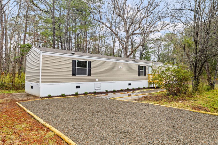 Exterior details and patio area of a home in , Summerville (Image 11).