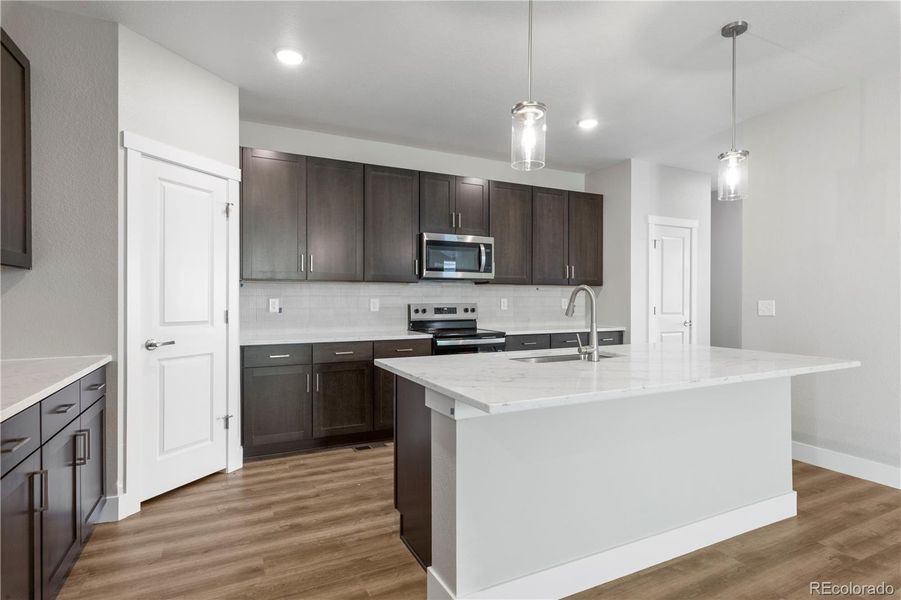 Furnished interior view inside a new home in Windler Single Family Homes, Aurora (Image 6). Furnished interior view inside a new home in Windler Single Family Homes, Aurora (Image 6).
