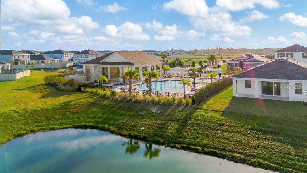Exterior details and patio area of a home in Mangrove Manor, Apollo Beach (Image 4).