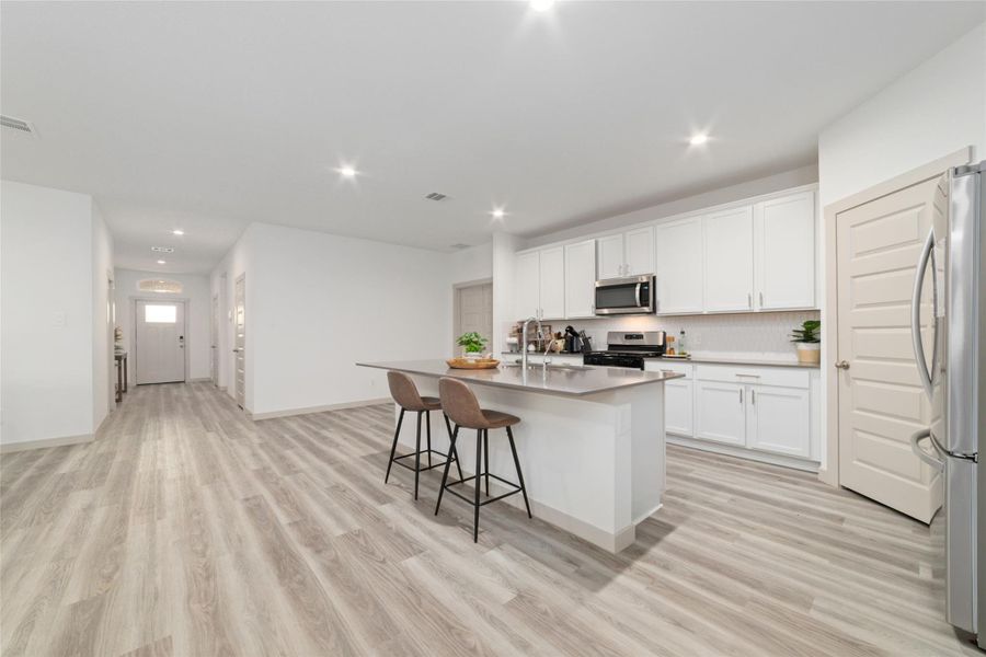 Furnished interior view inside a new home in Parks Edge, Missouri City (Image 13).