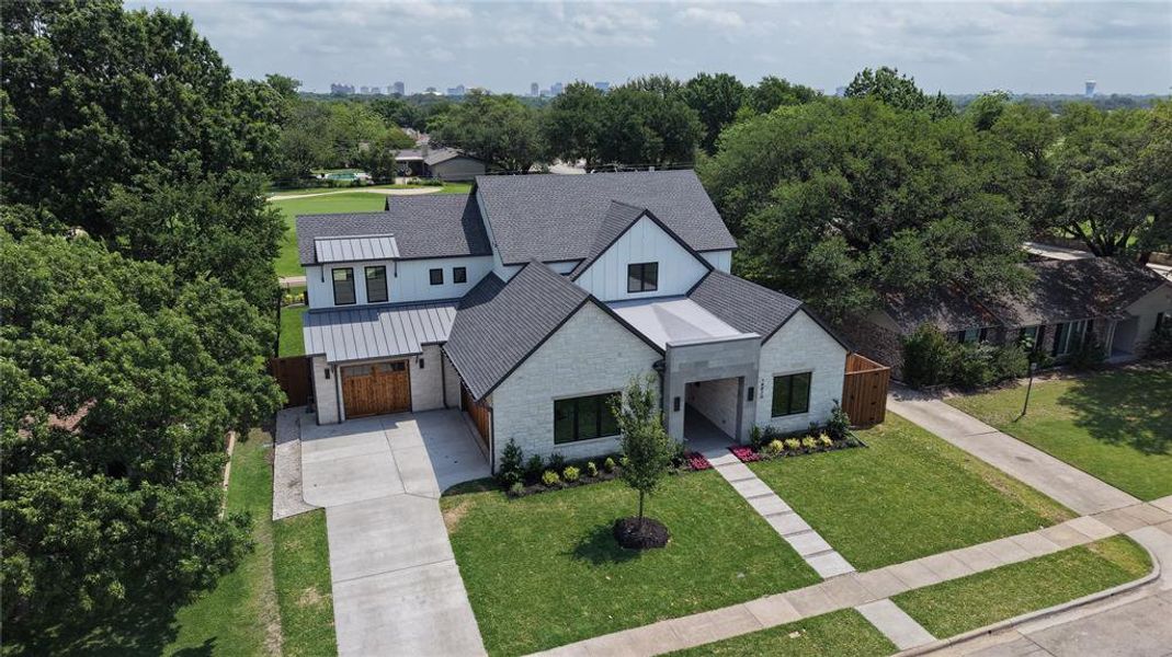 Contemporary architectural design with light-colored brick and dark trim