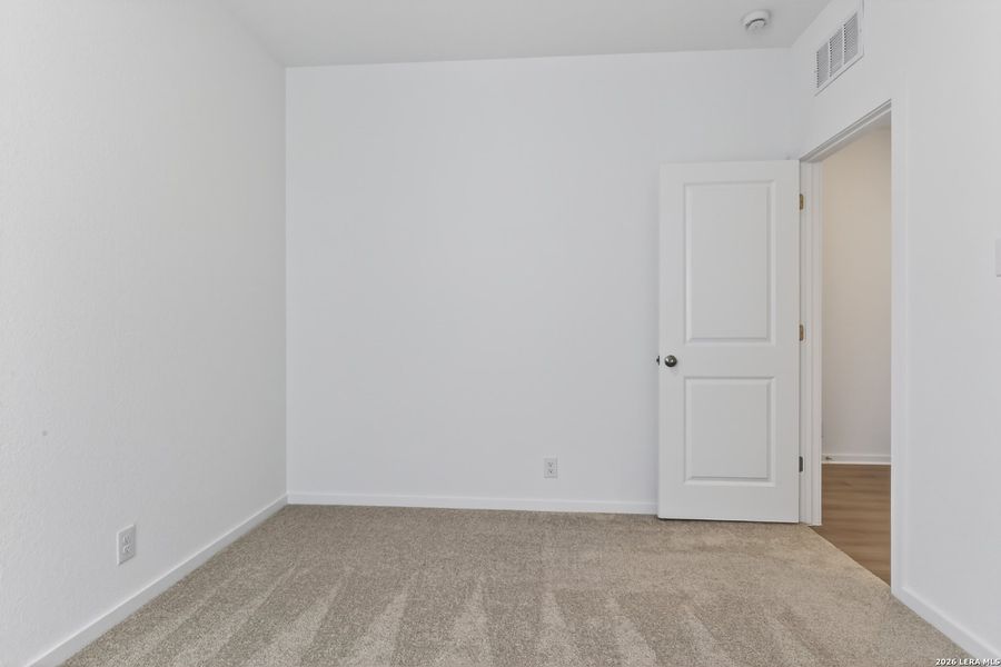 Spacious, unfurnished interior of a new home in Hennersby Hollow, San Antonio (Image 26).