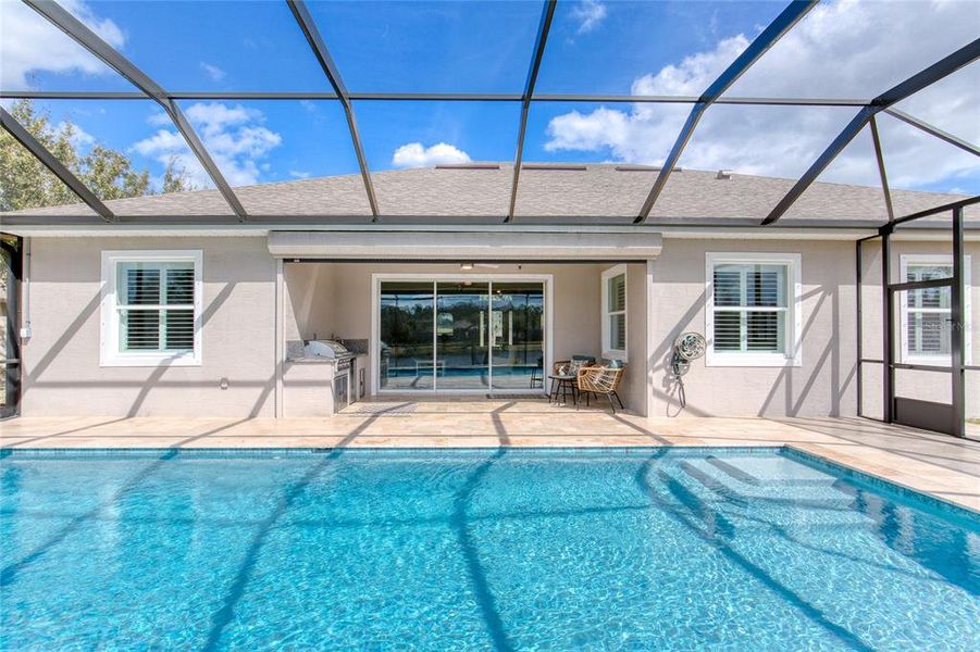 Exterior details and patio area of a home in , Ormond Beach (Image 26).
