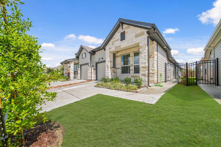 Exterior details and patio area of a home in , Iowa Colony (Image 21). Exterior details and patio area of a home in , Iowa Colony (Image 21).