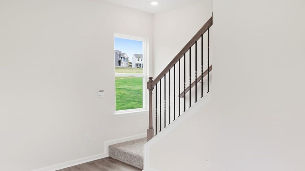 Spacious, unfurnished interior of a new home in Durbin Meadows Traditions, Fountain Inn (Image 25).