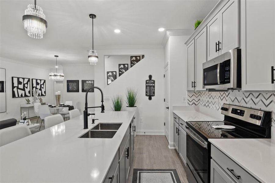 Furnished interior view inside a new home in Tohoqua, Kissimmee (Image 16).