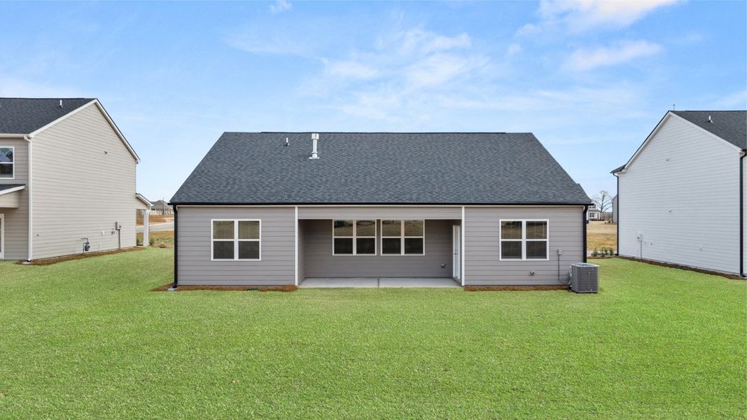 Exterior details and patio area of a home in Bridle Creek, Locust Grove (Image 21).