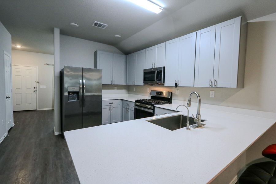 Furnished interior view inside a new home in Magnolia Ridge: Watermill Collection, Magnolia (Image 11). Furnished interior view inside a new home in Magnolia Ridge: Watermill Collection, Magnolia (Image 11).