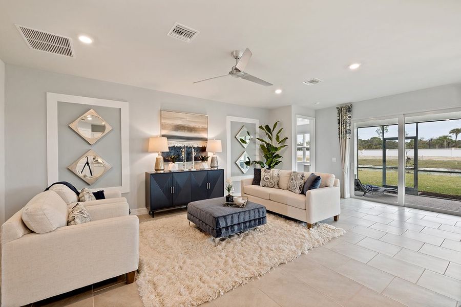 Representative furnished interior of a home built from the Delray by D.R. Horton in Coral Bay - Express & Tradition, North Fort Myers (Image 9).
