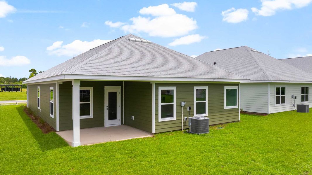 Front exterior of a new home in Caballeros Estates At Hombre, Panama City Beach, FL, highlighting curb appeal (Image 23). Front exterior of a new home in Caballeros Estates At Hombre, Panama City Beach, FL, highlighting curb appeal (Image 23).