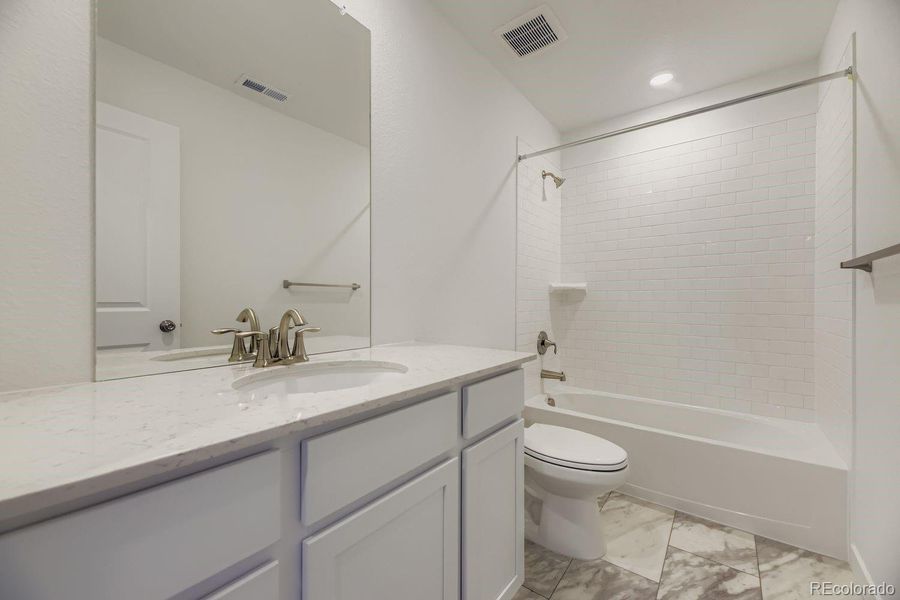 Furnished interior view inside a new home in Ken-Caryl Ranch, Littleton (Image 8).