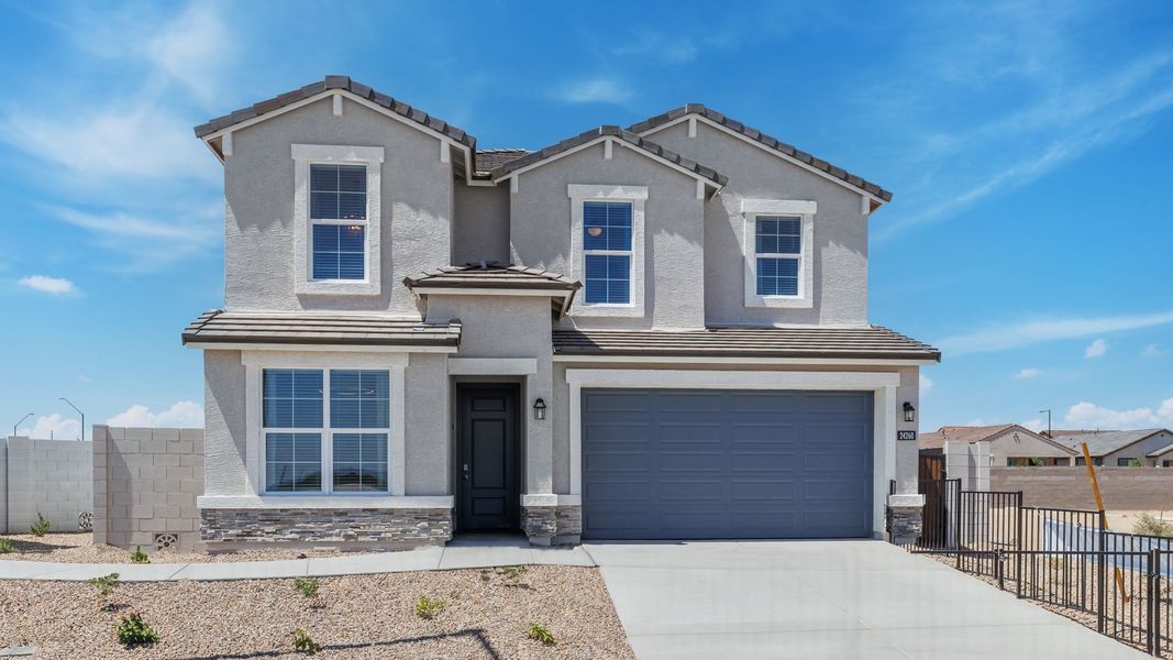 Representative exterior photo of a completed home built from the Stork by D.R. Horton in Apache Farms, Buckeye, AZ (Image 20).