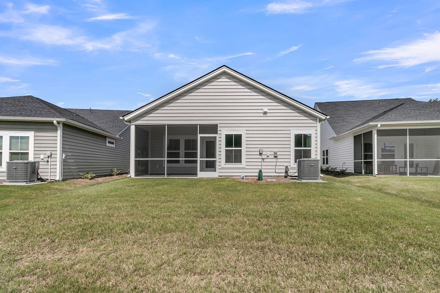 Front exterior of a new home in Horizons at Summers Corner | 55+: The Cottages, Summerville, SC, highlighting curb appeal (Image 20). Front exterior of a new home in Horizons at Summers Corner | 55+: The Cottages, Summerville, SC, highlighting curb appeal (Image 20).