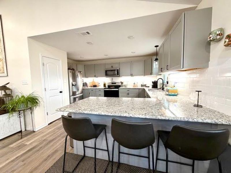 Furnished interior view inside a new home in , Poynor (Image 25).