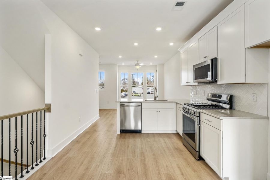 Furnished interior view inside a new home in Renaissance Place, Greenville (Image 4).