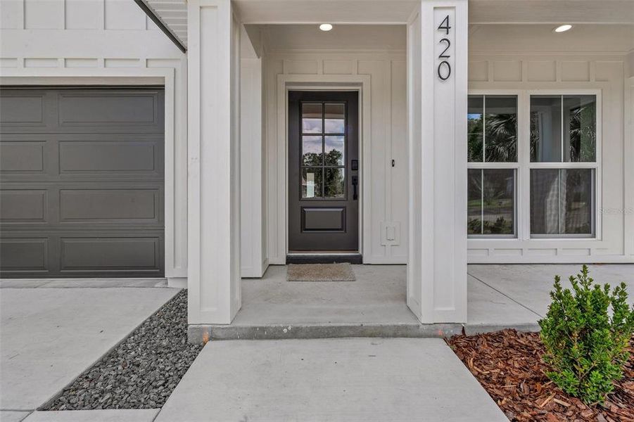 Front exterior of a new home in , Lakeland, FL, highlighting curb appeal (Image 18).
