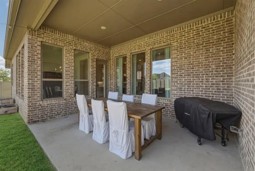 Covered back patio with East facing backyard makes for great afternoon shade for backyard BBQs. Covered back patio with East facing backyard makes for great afternoon shade for backyard BBQs.