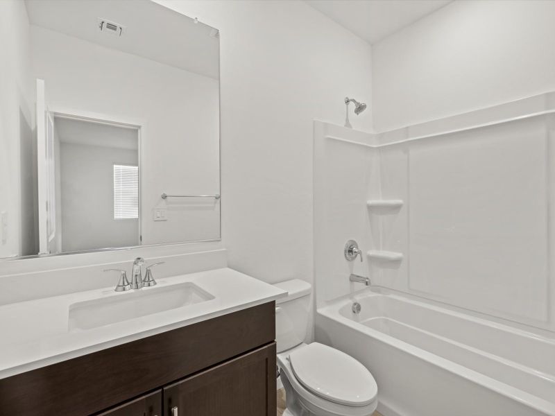 Furnished interior view inside a new home in Rancho Mirage Estate Series, Maricopa (Image 5).