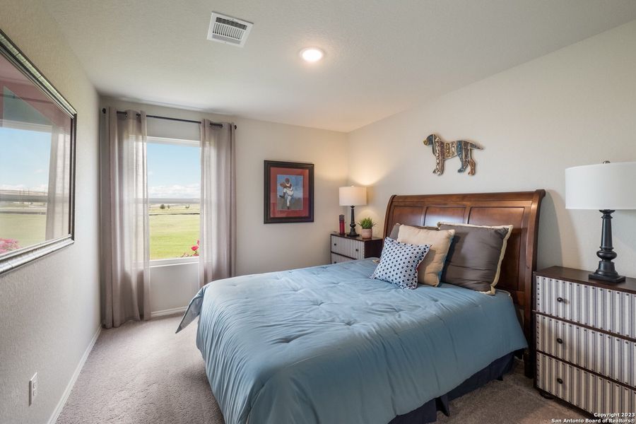 Furnished interior view inside a new home in Navarro Ranch: Cottage Collection, Seguin (Image 13). Furnished interior view inside a new home in Navarro Ranch: Cottage Collection, Seguin (Image 13).