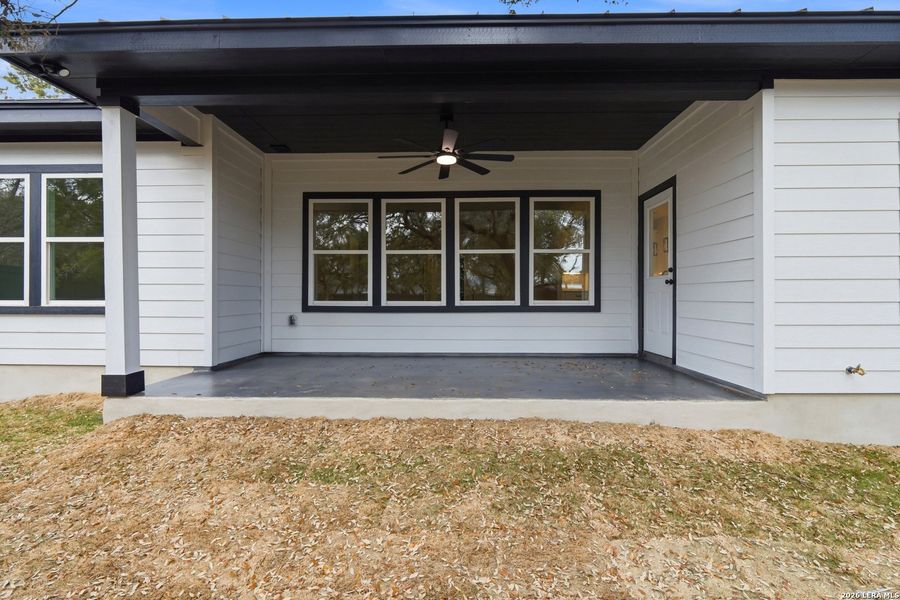 Exterior details and patio area of a home in , Spring Branch (Image 3).