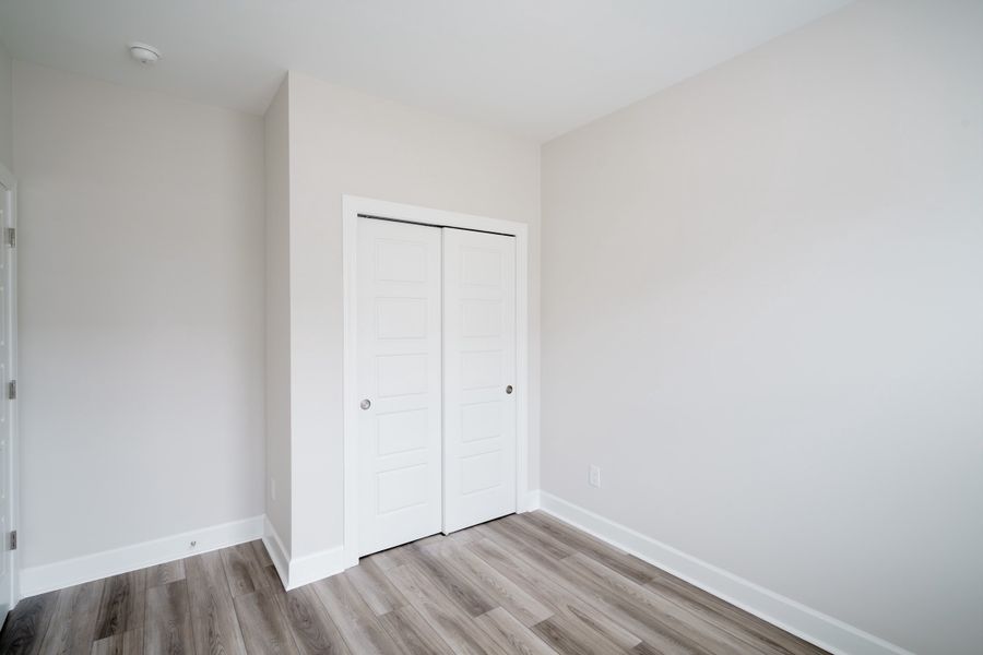 Representative unfurnished interior of a home built from the The Holland by Cothran Homes in Holly Ridge, Greenville (Image 29).