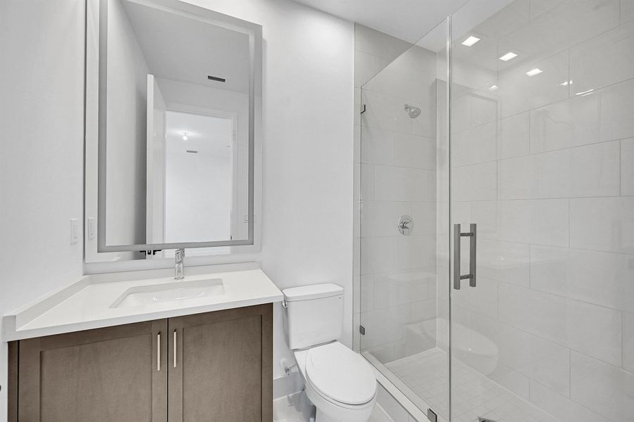 Furnished interior view inside a new home in Apex at Avenir, Palm Beach Gardens (Image 14).