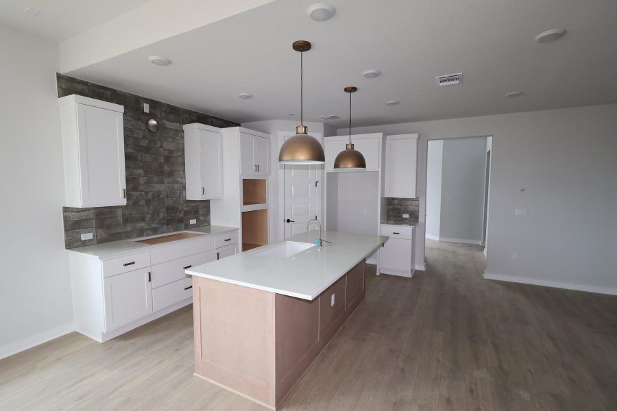Furnished interior view inside a new home in Terrace Collection At Turner's Crossing, Buda (Image 16).