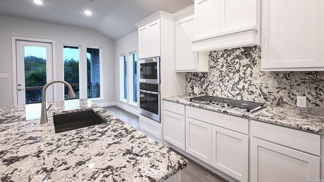 Furnished interior view inside a new home in Johnson Ranch 55', Bulverde (Image 7).