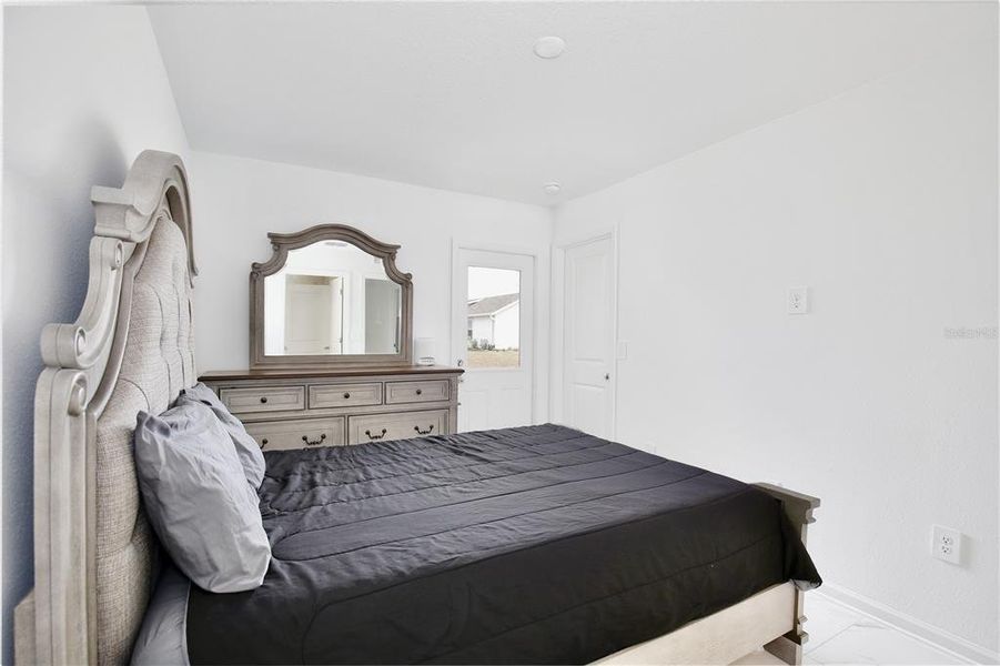 Furnished interior view inside a new home in Peace Creek Reserve, Winter Haven (Image 18).