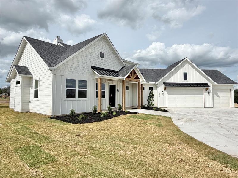 Front exterior of a new home in , Weatherford, TX, highlighting curb appeal (Image 26).