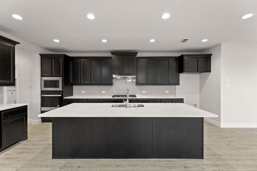 Representative exterior photo of a completed home built from the Winchester by Impression Homes in Timberbrook, Justin, TX (Image 6).