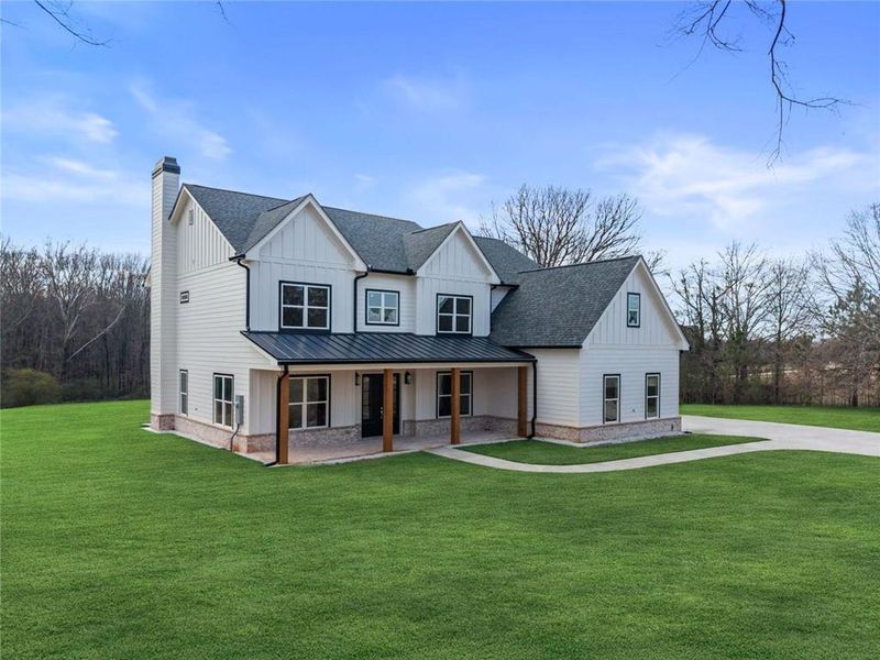 Front exterior of a new home in , Social Circle, GA, highlighting curb appeal (Image 27).