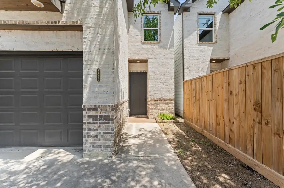 Exterior details and patio area of a home in , Houston (Image 3).