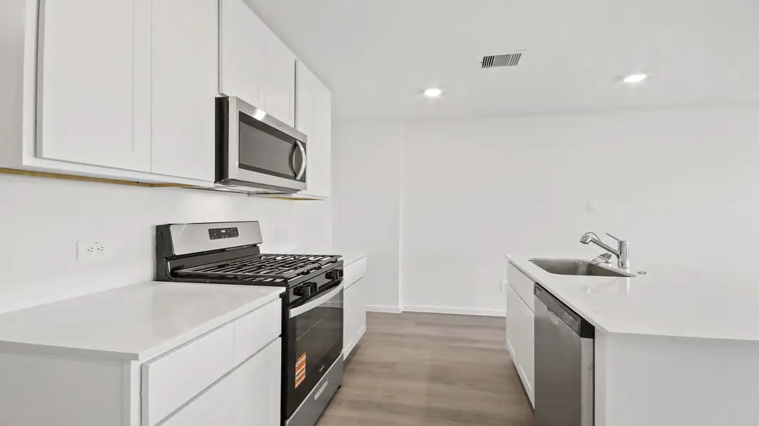 Furnished interior view inside a new home in Lexington Heights, Willis (Image 6).