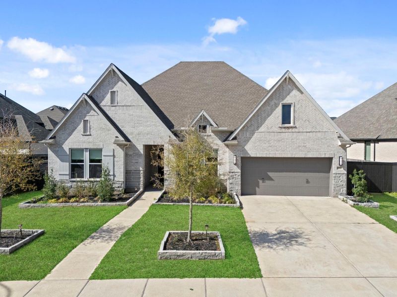 Front exterior of a new home in , Richmond, TX, highlighting curb appeal (Image 2).