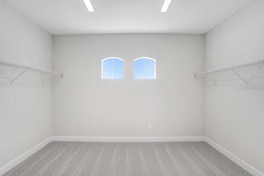 Spacious, unfurnished interior of a new home in Lake Toscana, Wimauma (Image 24).