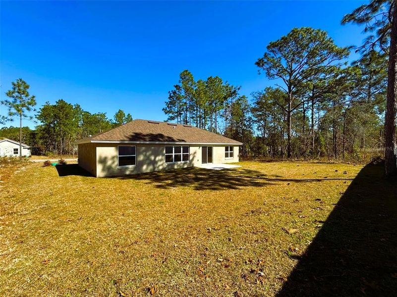 Exterior details and patio area of a home in , Citrus Springs (Image 14).
