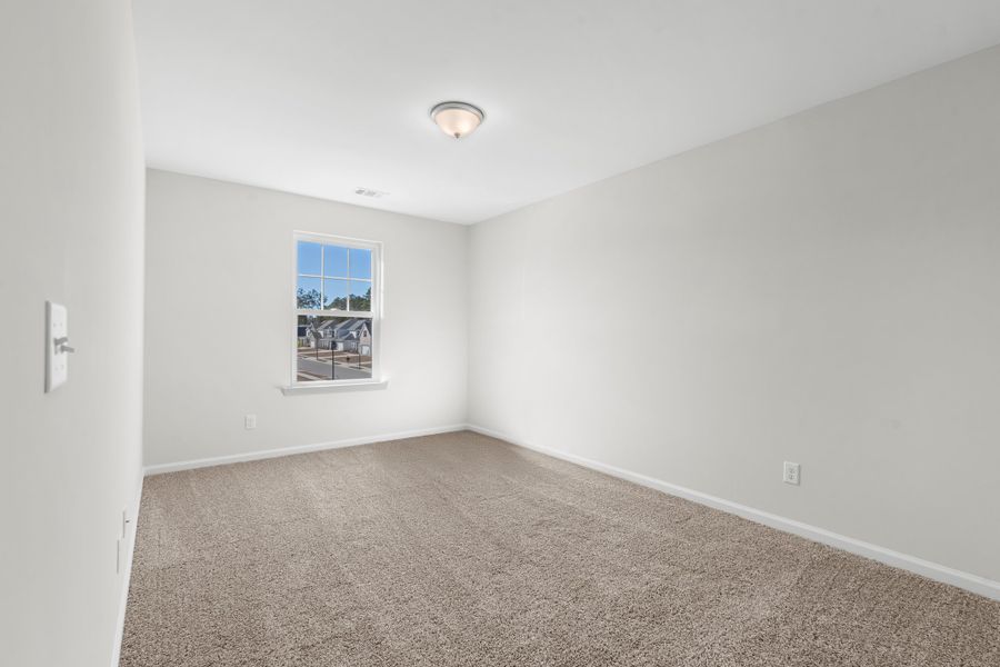 Representative unfurnished interior of a home built from the The Hatteras by Smith Family Homes in Savannah Highlands, Savannah (Image 25).