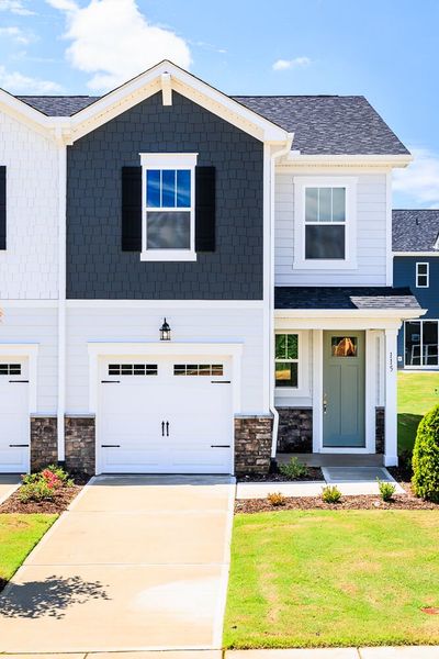 Front exterior of a new home in Vaughan Farms, Angier, NC, highlighting curb appeal (Image 2).