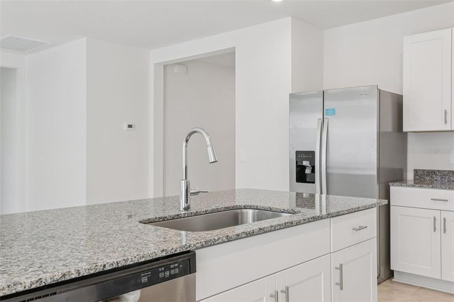 Furnished interior view inside a new home in Deer Run at Crosswinds, Davenport (Image 7).