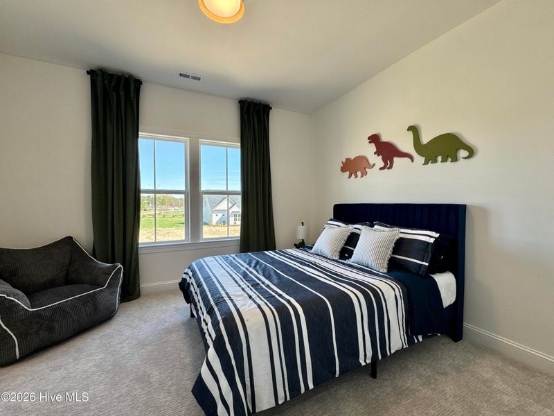 Furnished interior view inside a new home in Dixon Grove, Grimesland (Image 14).