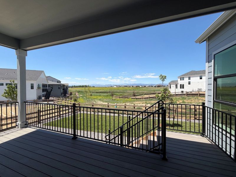 Exterior details and patio area of a home in Kitchel Lake at Serratoga Falls, Timnath (Image 2).