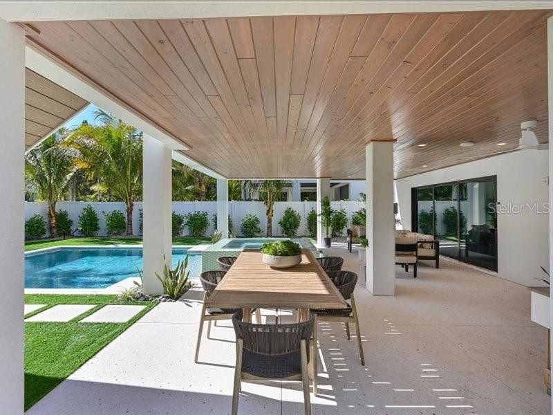 Exterior details and patio area of a home in , Anna Maria (Image 26).