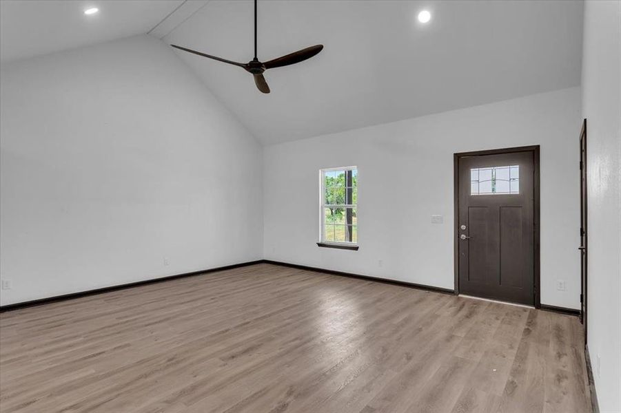Great living room connects to dining and kitchen.