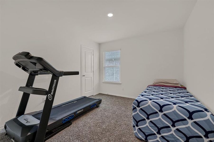 Workout area with baseboards, recessed lighting, and carpet flooring